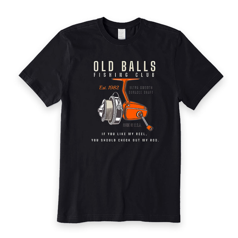 Black t-shirt with fishing reel graphic and text on a white background