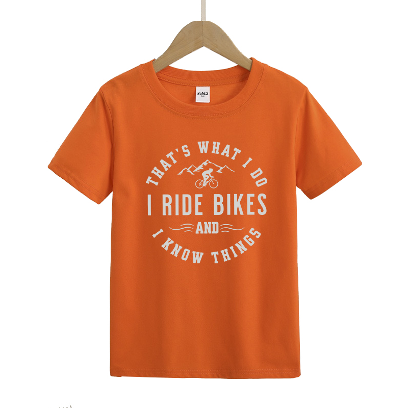 That's What I Do I Ride Bikes and Know Things Kids T-Shirt
