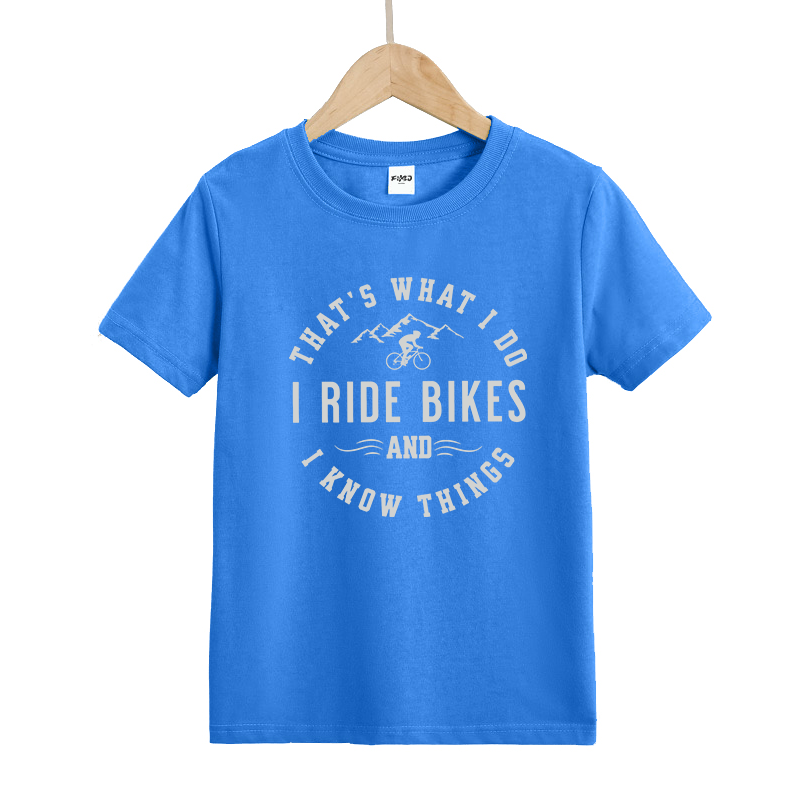 That's What I Do I Ride Bikes and Know Things Kids T-Shirt